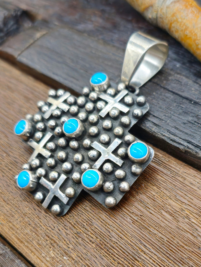 Cross-Shaped Sterling Silver Raindrop and Turquoise Pendant by Geneva Apachito