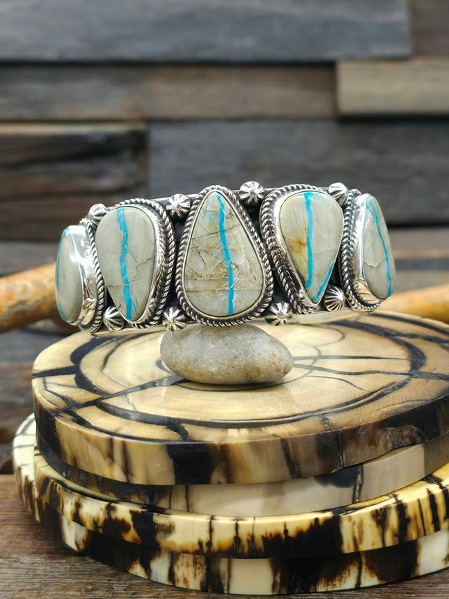 Stamped Sterling Silver and Ribbon Turquoise Cuff by Delbert Delgarito  - 6 3/4 in.