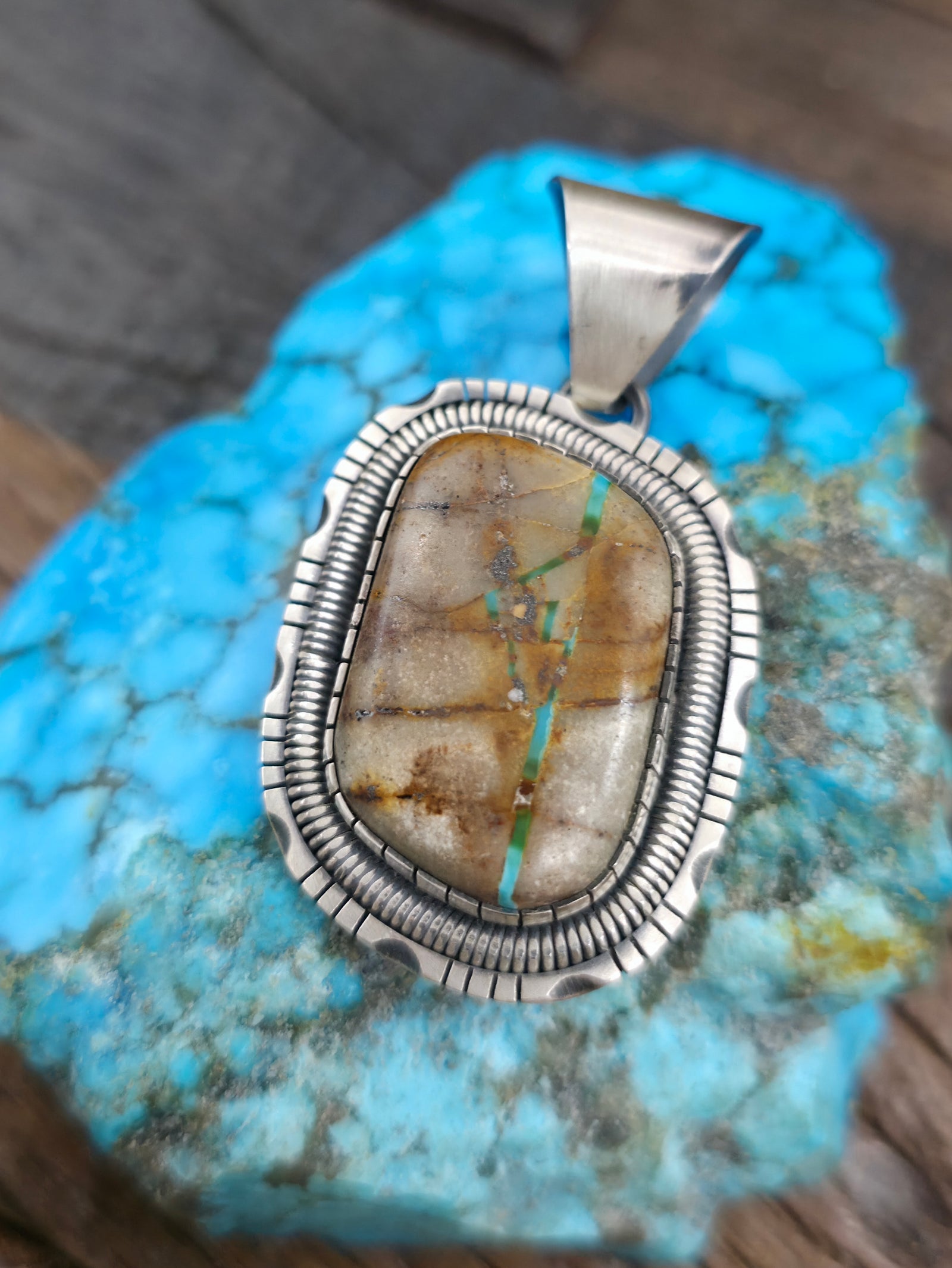 Sterling Silver Blue Gem Ribbon Turquoise Pendant by Walter Vandever - 2 in. by 1 in.