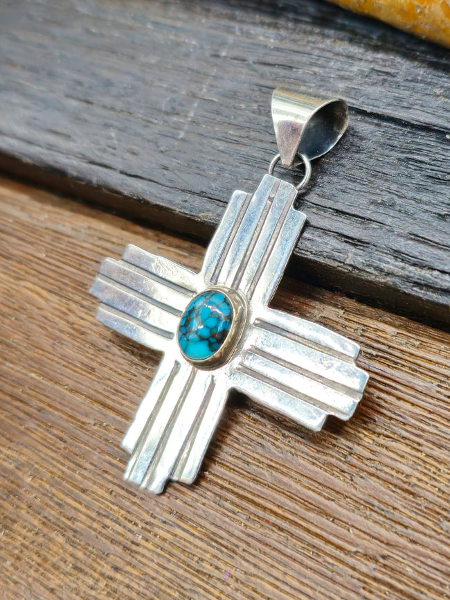 Zia Sterling Silver Pendant with Dark Blue Oval Turquoise Stone by Lucille Platero
