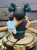Taos Storyteller Figurine with Three Children, made with Micaceous Clay by Aaron M. - 3 1/2