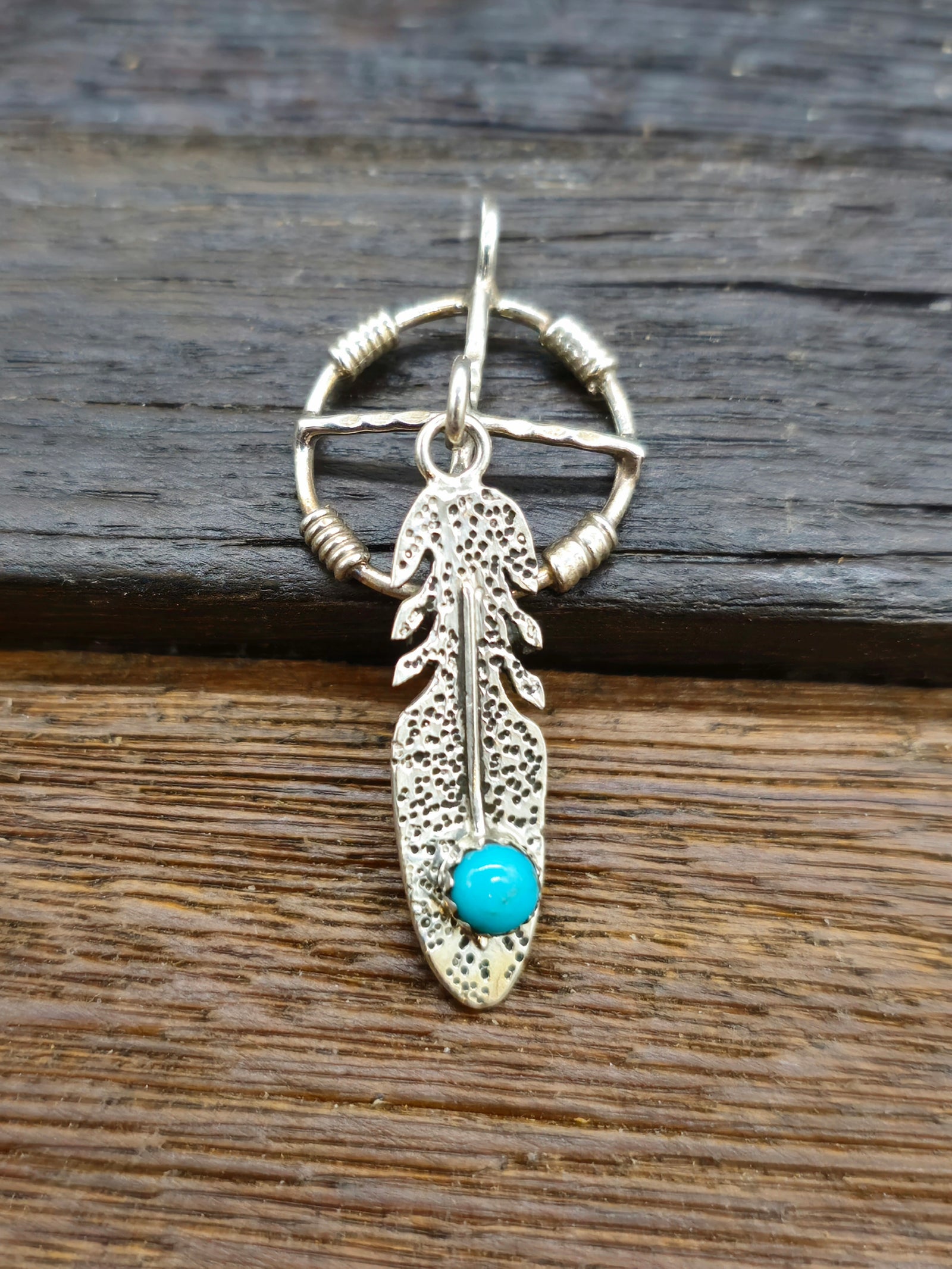 Sterling Silver and Turquoise Feathered Shield Pendant by Kenny Lonjose