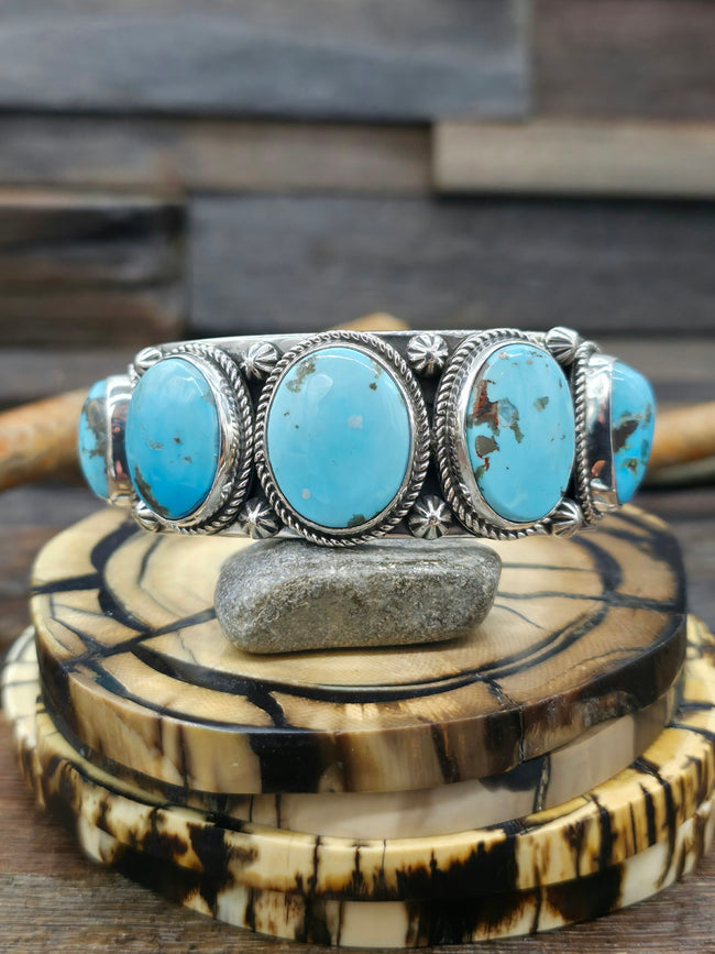 Stamped Sterling Silver and Kingman Turquoise Cuff by Delbert Delgarito  - 7 in.