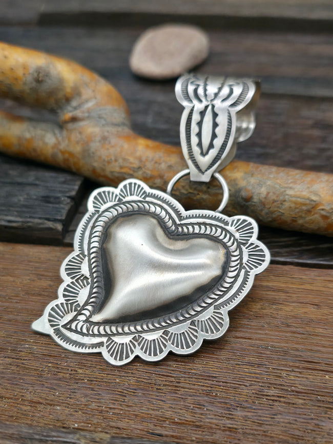 Sterling Silver Heart Pendant by Leander Tahe