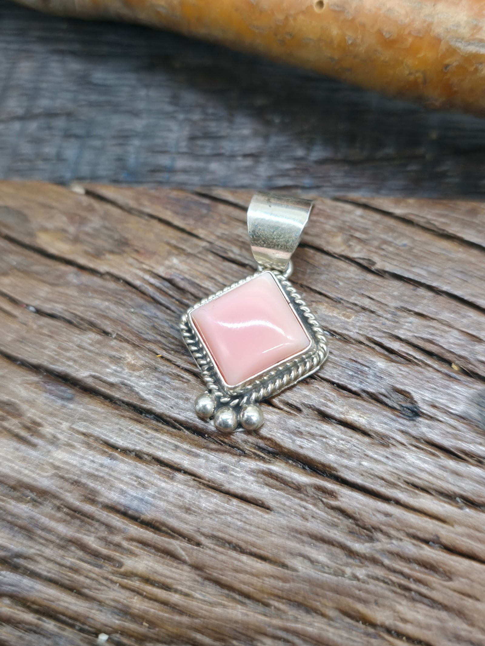 Sterling Silver Pink Conch Pendant by B. Begay - 1 in. by 1/2 in.