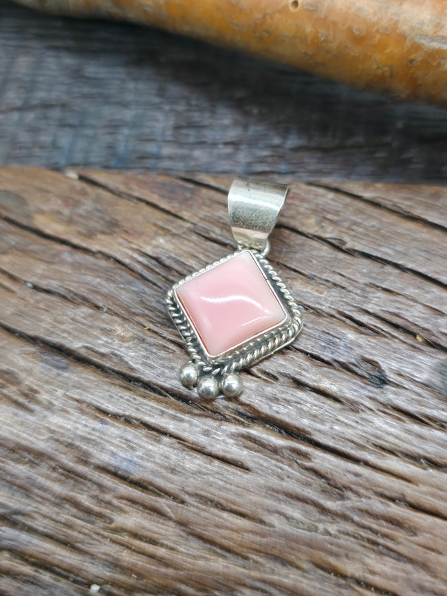 Sterling Silver Pink Conch Pendant by B. Begay - 1 in. by 1/2 in.