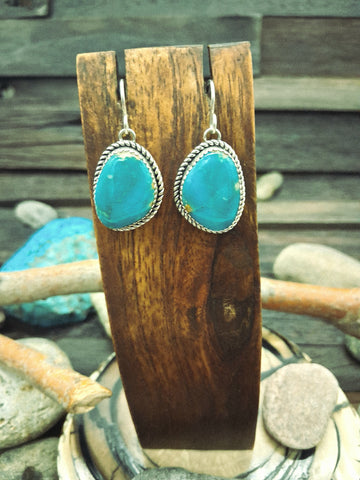 Sterling Silver Star Repousse earrings by Juanita Long - Navajo (1  1/14")