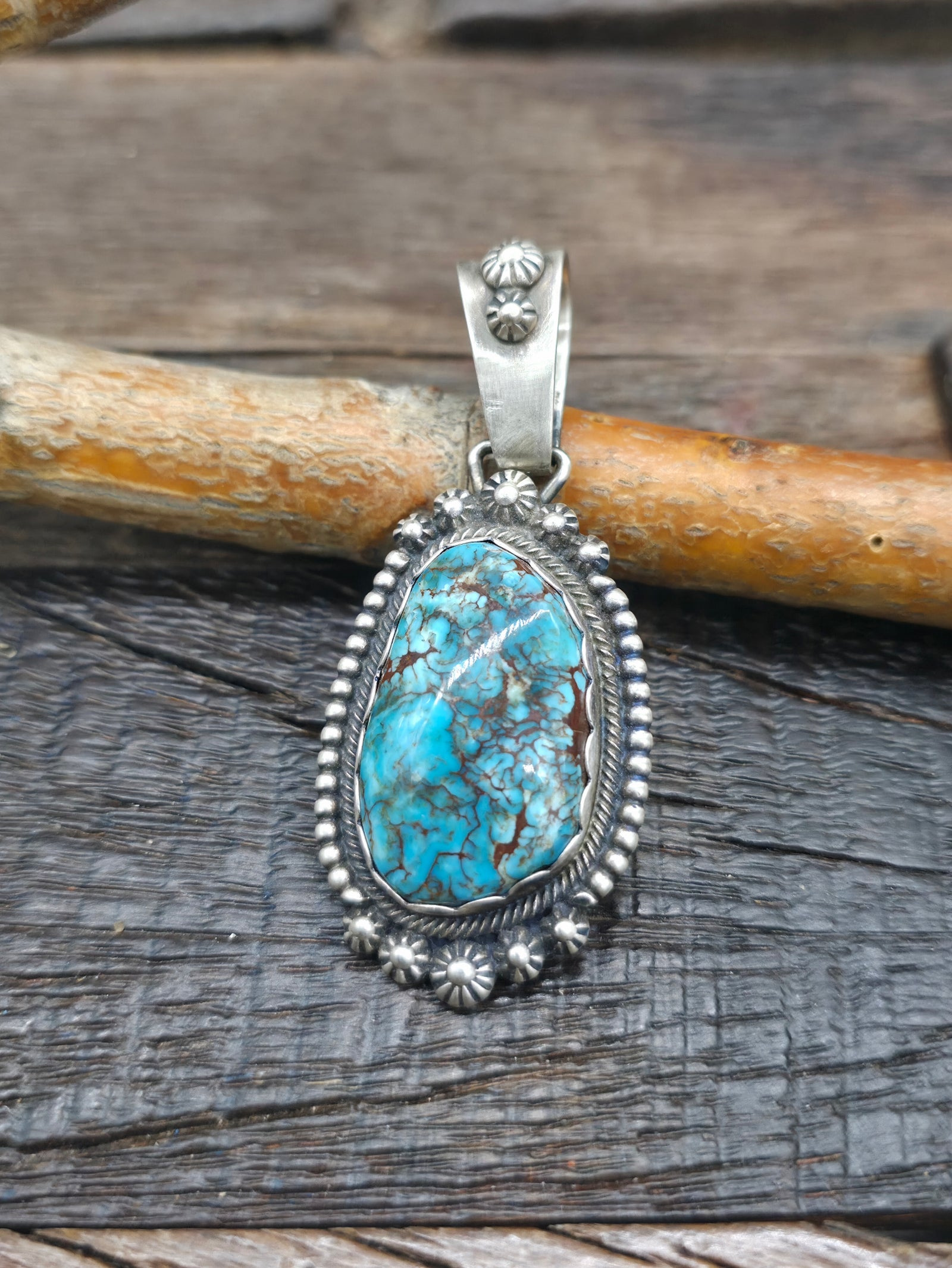 Sterling Silver Bisbee Turquoise Pendant by P. Begay - 2 1/2 in. by 1 in.