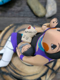 Jemez Storyteller Figurine with Two Children and Book, made by D. Lucero - 3 1/4