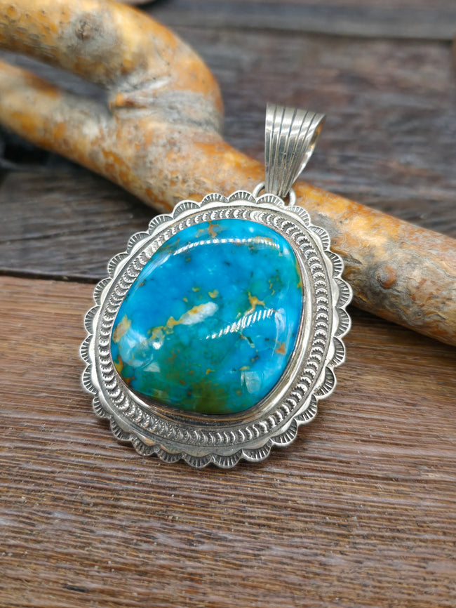 Turquoise and Sterling Silver Stamped Round Pendant by June Delgarito