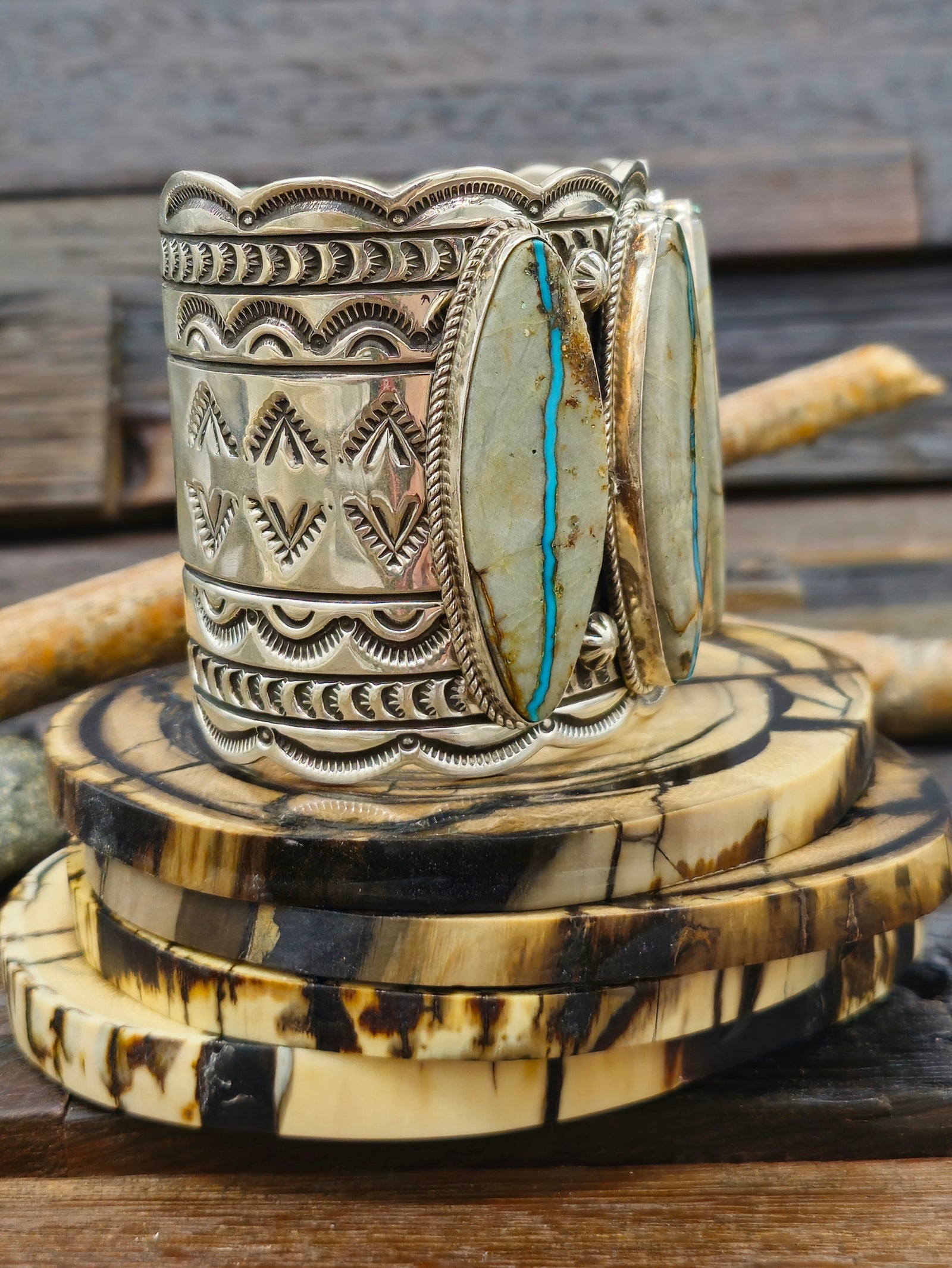 Wide Stamped Sterling Silver and Blue Gem Ribbon Turquoise Cuff by Delbert Delgarito