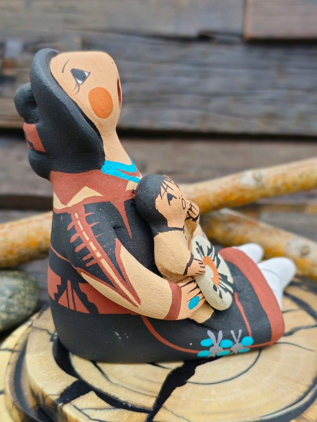Jemez Storyteller Figurine with Two Children and Basket, made by D. Lucero - 3 1/4" by 3 1/4" by 2 1/2"
