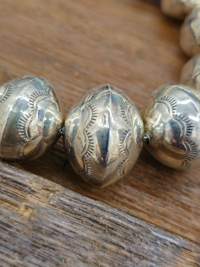Stamped, Graduated High-Shine Navajo Pearl Necklace by Jeffrey Castillo - 29 in.