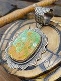 Turquoise Pendant with Stamped Sterling Silver by Leon Martinez