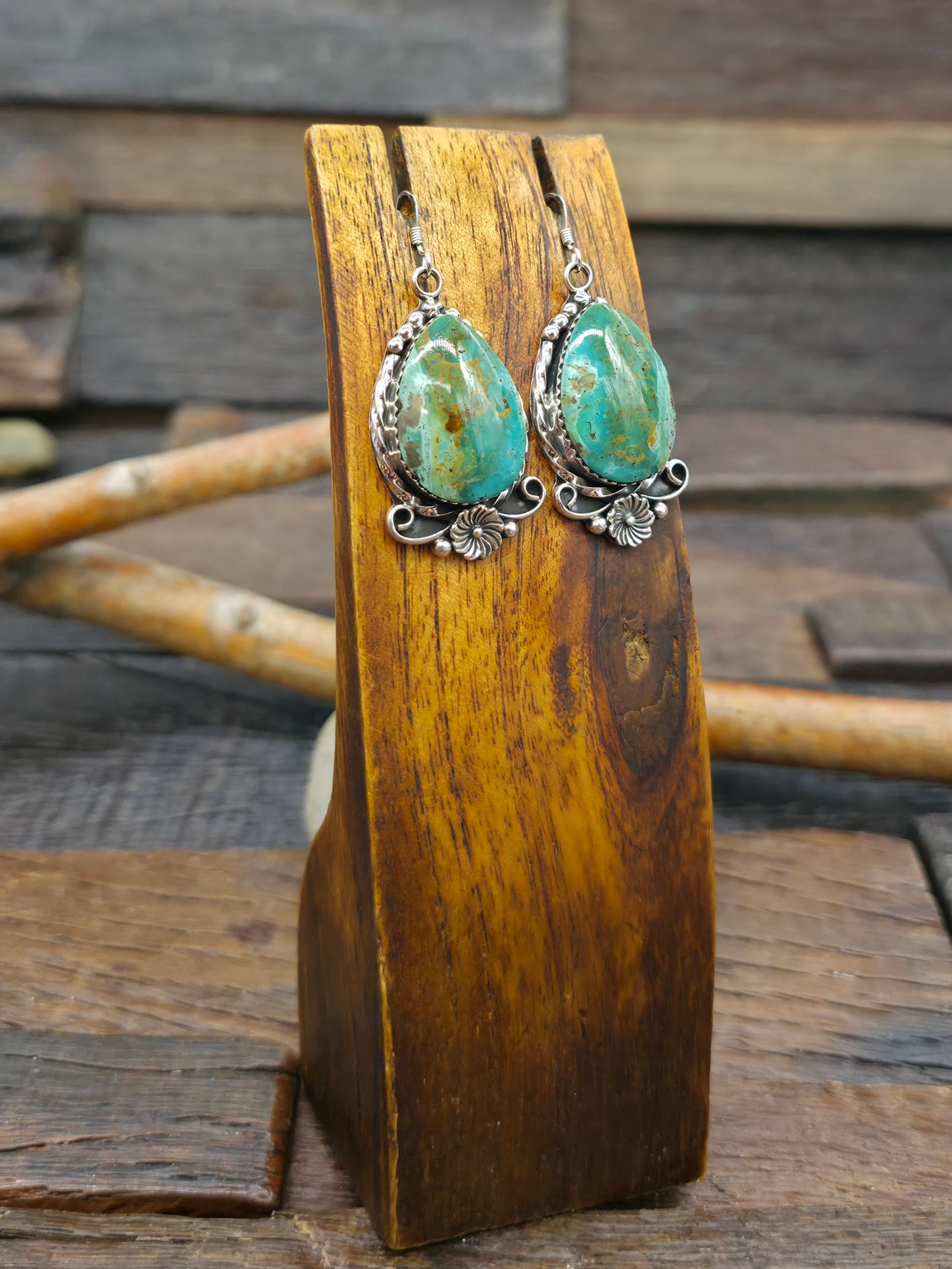 Sterling Silver Dark Green Turquoise Earrings with Flower Applique by Loretta Delgarito - 2 in. by 3/4 in.
