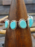 Seven Stone Turquoise Leather Buckle Bracelet