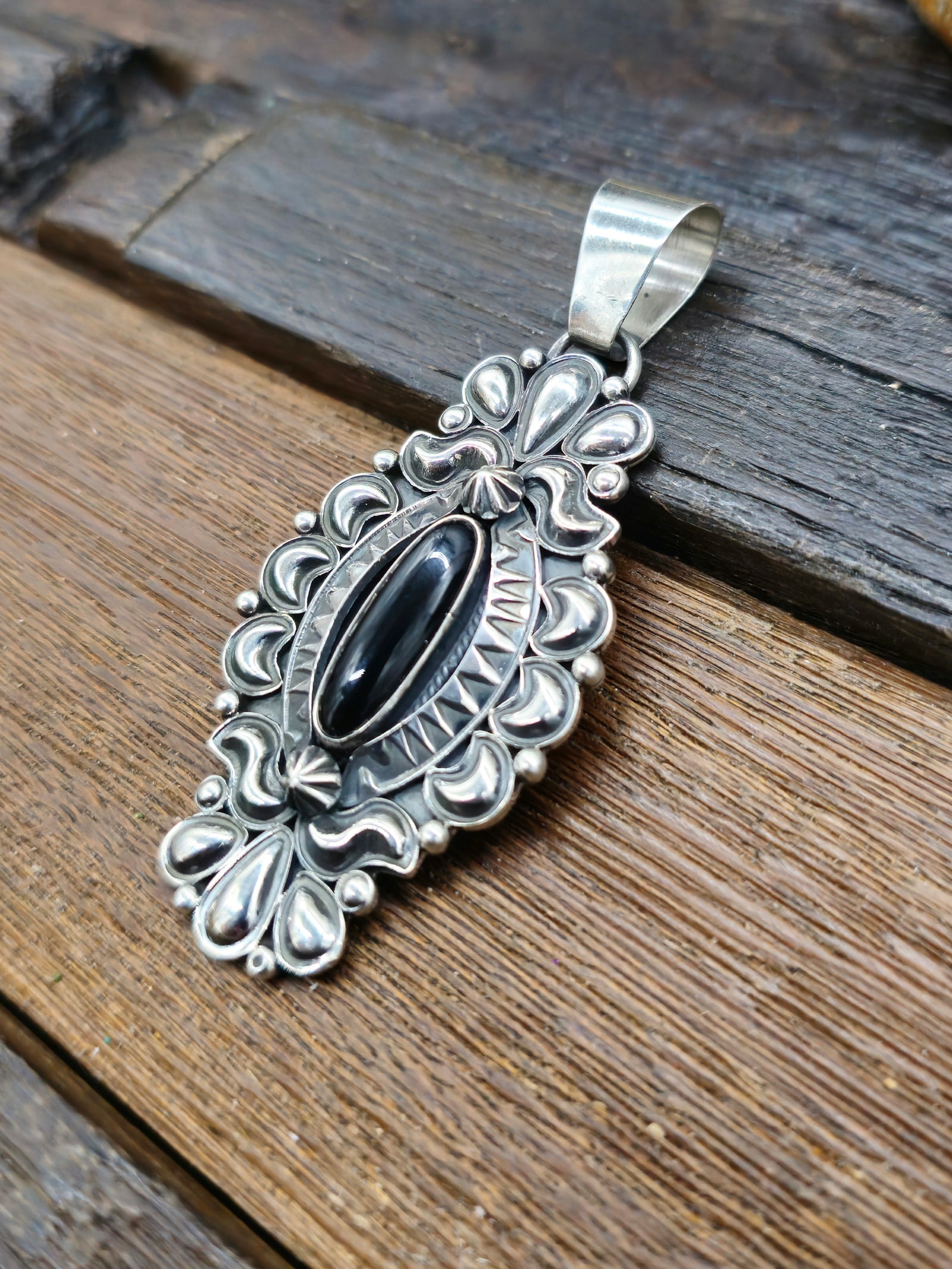 Sterling Silver Black Onyx Oval Pendant by Derrick Gordon