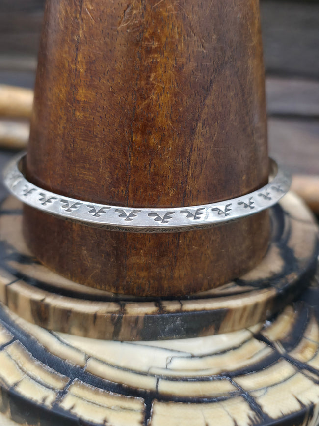 Stamped Sterling Silver Bangle by Wylie Secatero - Arrowheads Pattern - 9 in.