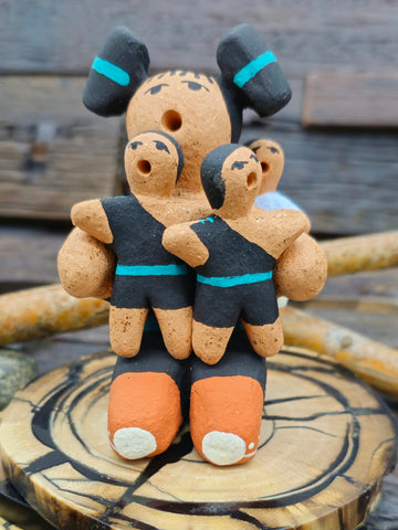 Jemez Storyteller Figurine with Two Infants by Chrislyn Fragua - 4" by 3" by 1 1/2"
