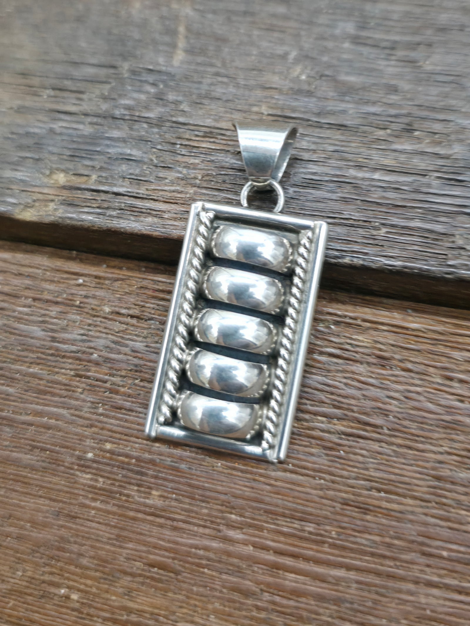Sterling Silver Pendant by P.A. - Wide Coil - 1 3/4 in. by 3/4 in.