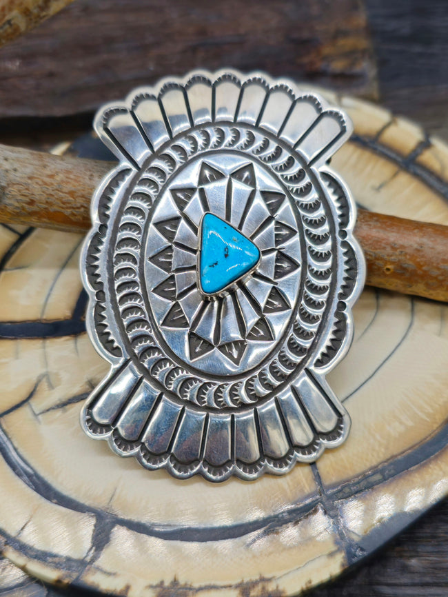 Sterling Silver and Candelaria Turquoise Buckle by Delbert Delgarito