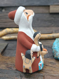 Standing Santa Claus Jemez Storyteller Figurine by D. Lucero - 5 in. by 2 1/2 in. by 2 1/2 in.