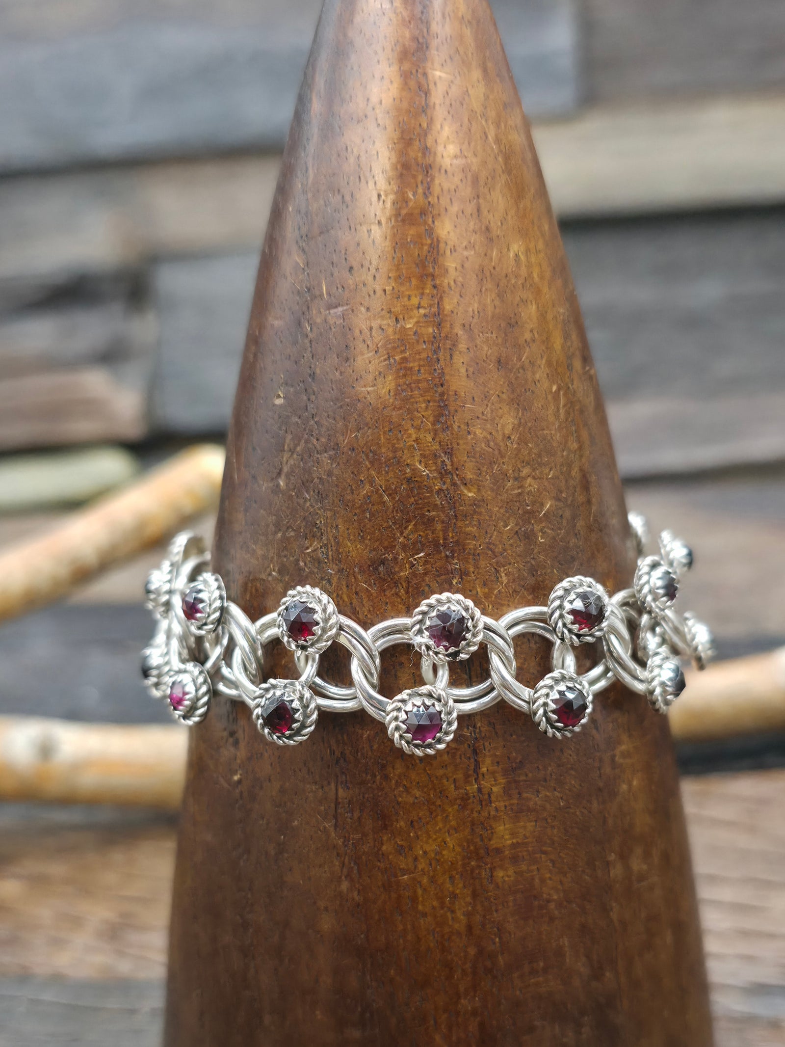 Sterling Silver Faceted Garnet Snake Eye Bracelet by Dillion Cheama - 7 in.