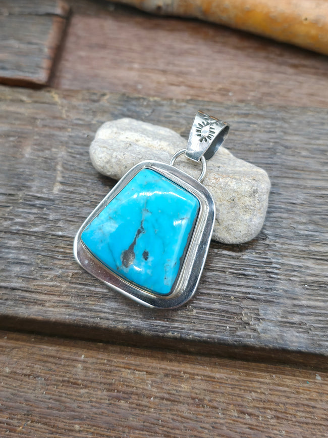 High Shine Sterling Silver Candelaria Turquoise Pendant by Rosella Paxson - 1 1/2 in. by 1 in.