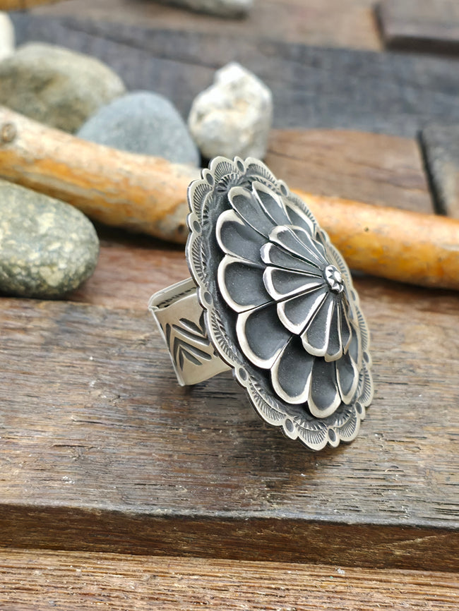 Adjustable Round Stamped Sterling Silver Ring by Leander Tahe