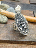 Adjustable Round Stamped Sterling Silver Ring by Leander Tahe