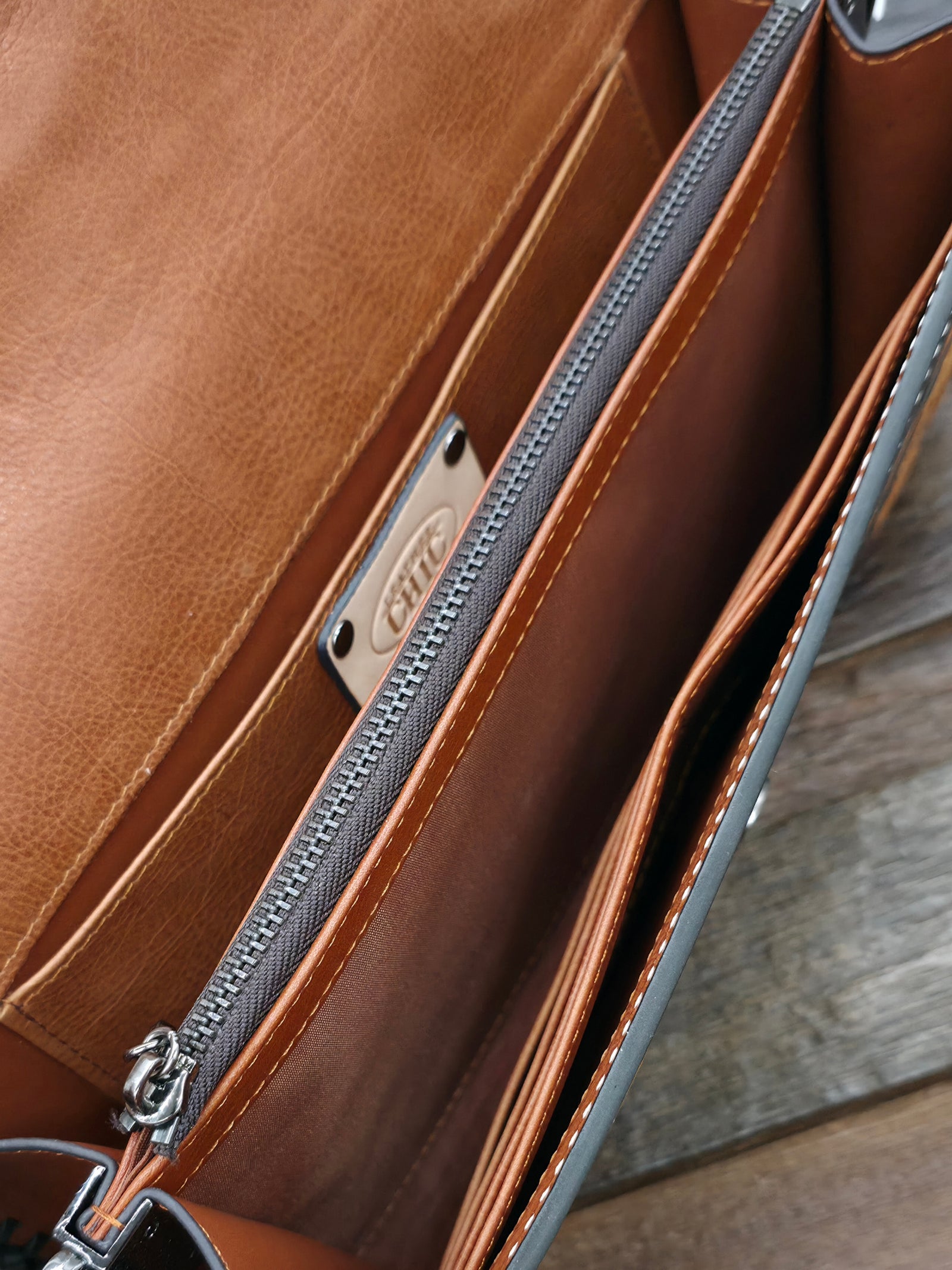 Hammered Black and Brown Leather Crossbody Purse by Leather Chic - 10 in. by 5 in. by 2 in.