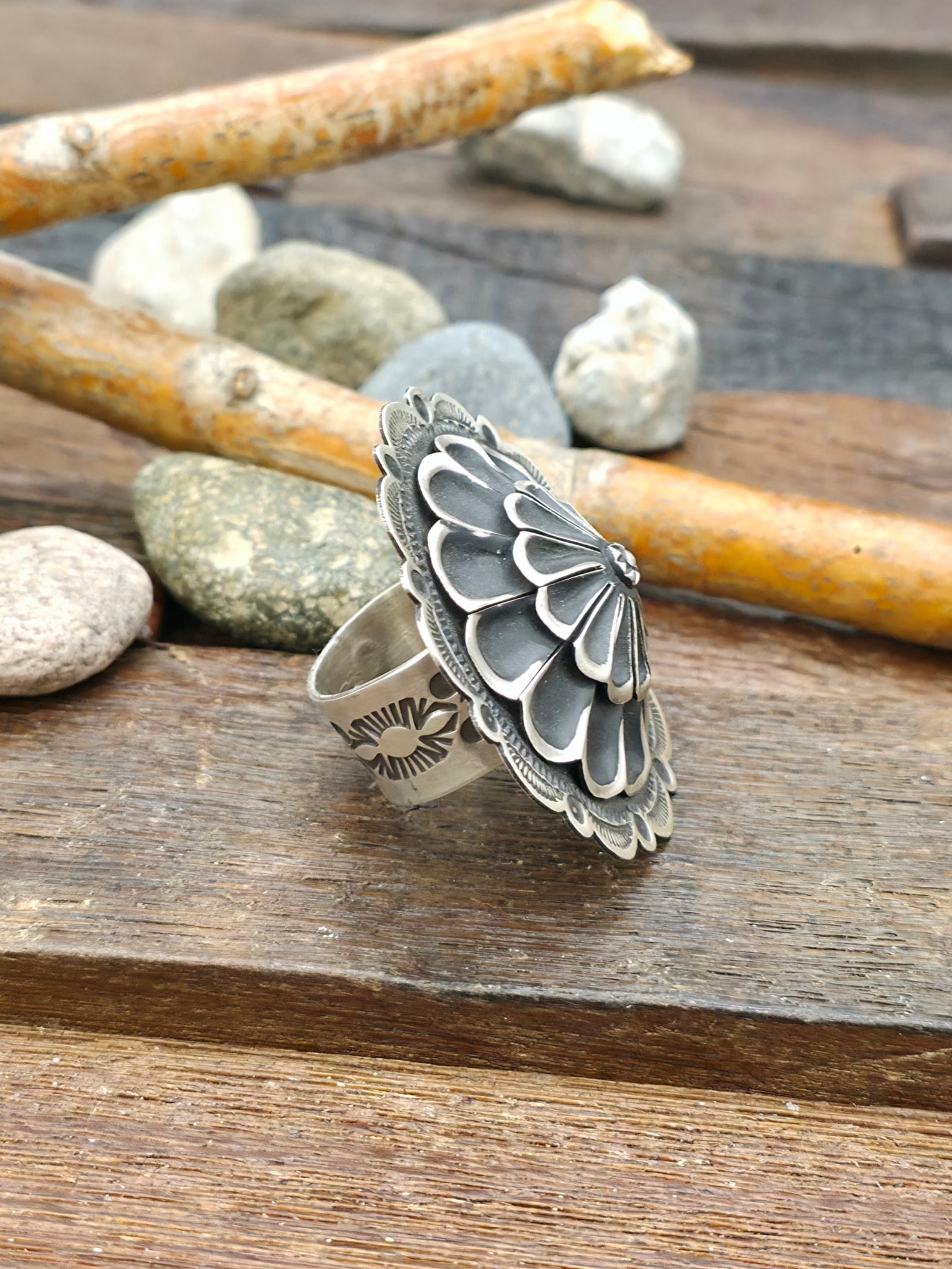 Adjustable Round Stamped Sterling Silver Ring by Leander Tahe