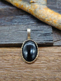 Small Black Onyx Oval Pendant by Benny Tahe