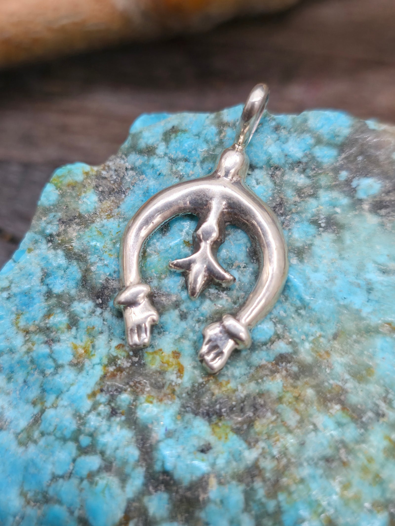 Mini Sterling Silver Naja Pendant by Pauline Nelson - 1 1/8 in. by 5/8 in.