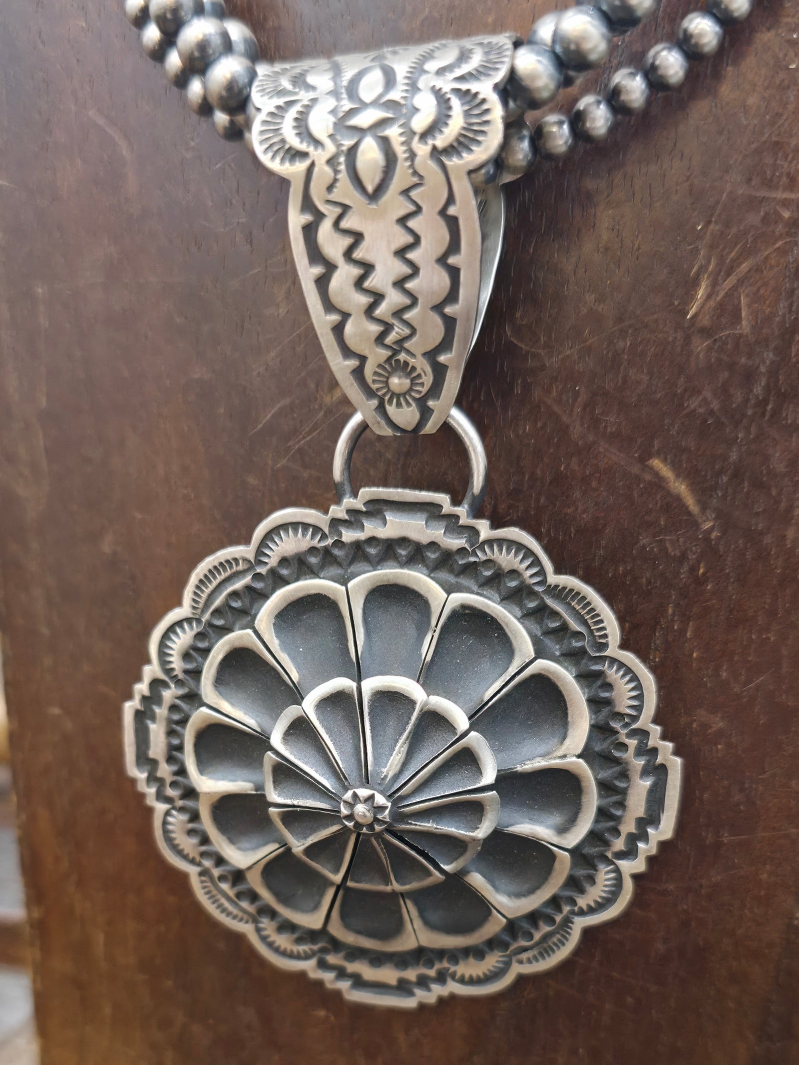 Stamped Sterling Silver Pendant by Leander Tahe on Three Strand Sterling Silver Bead Necklace - 16 in. plus 4 in. Extender