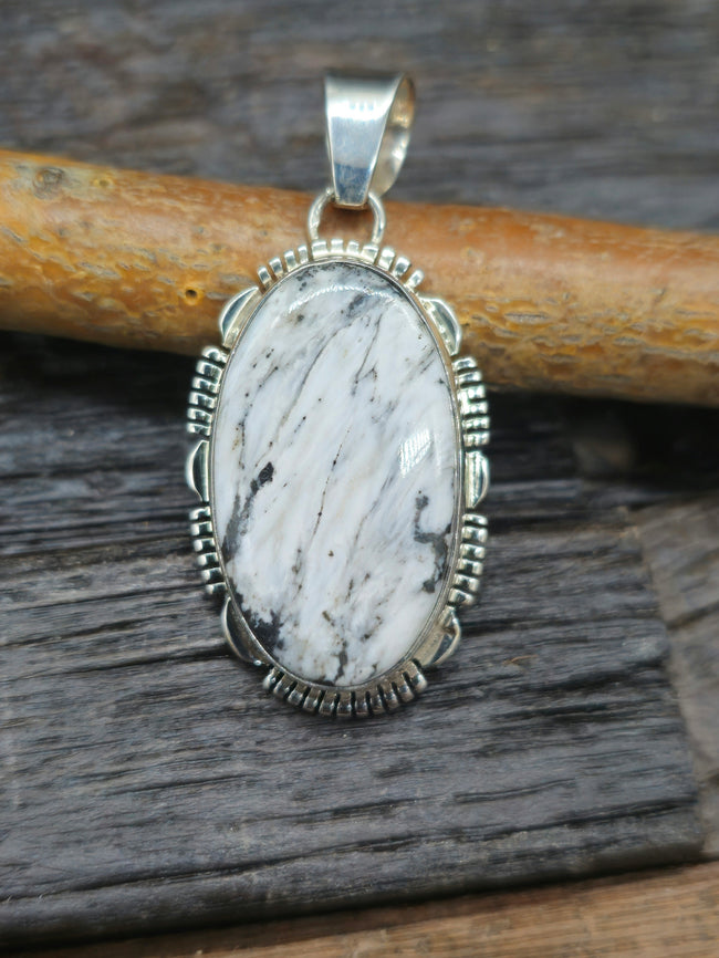 Sterling Silver Oval White Buffalo Pendant by L. Yazzie
