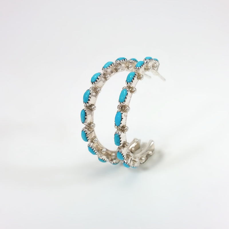 Bernard Cadnini turquoise sterling silver hoop earrings.