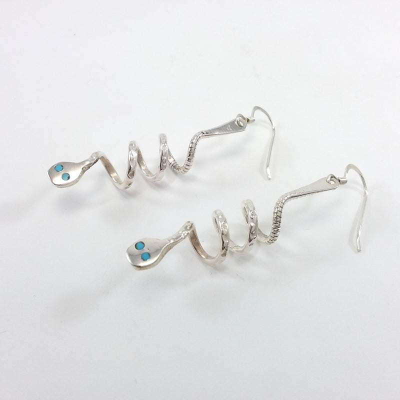 Effie Calabaza sterling silver with turquoise snake earrings.