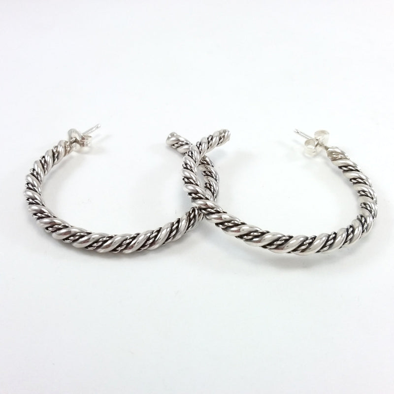 Navajo sterling silver twist hoop earrings.