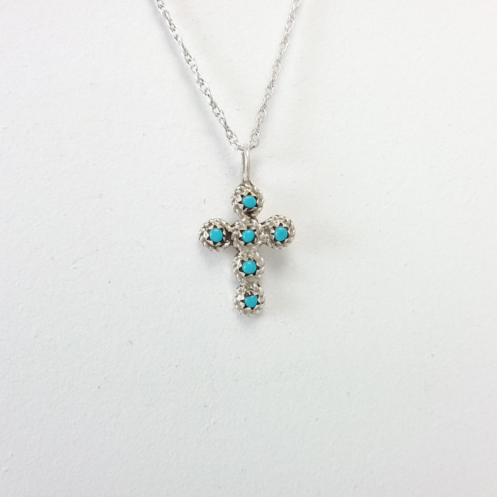 Navajo turquoise sterling silver cross pendant.