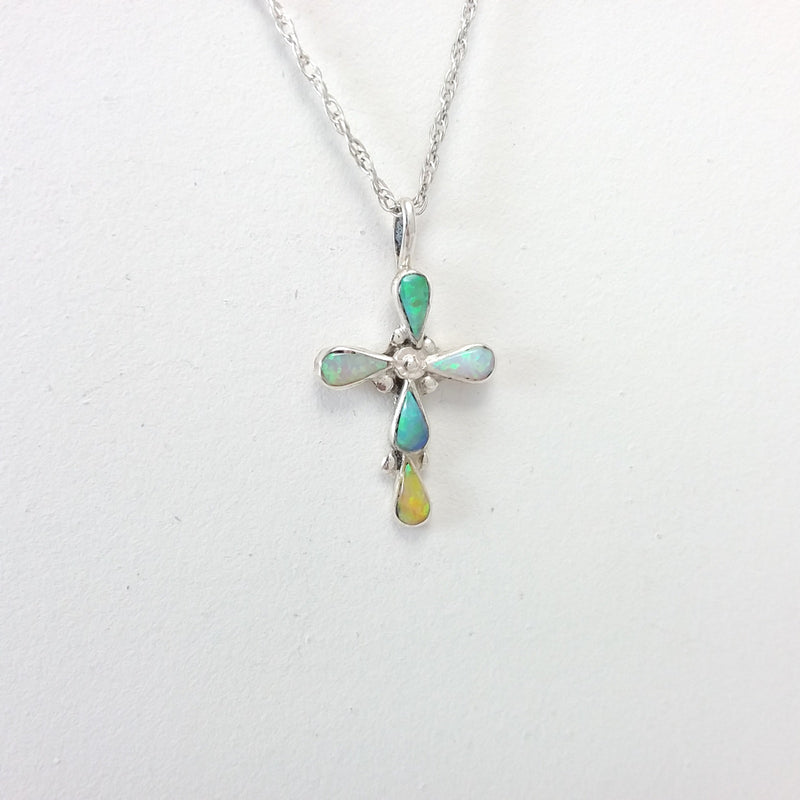 Navajo multi colored opal sterling silver cross pendant.