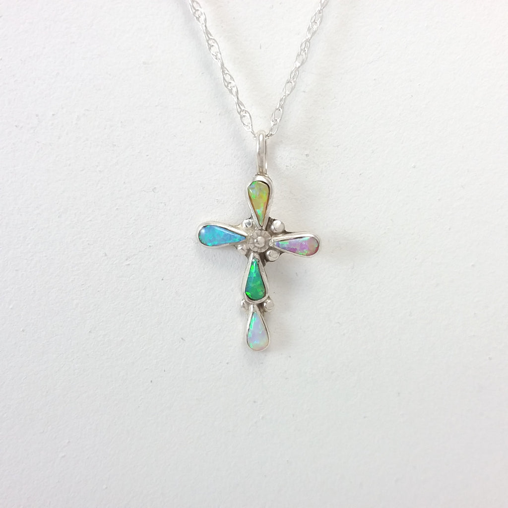 Navajo multi colored opal sterling silver cross pendant.