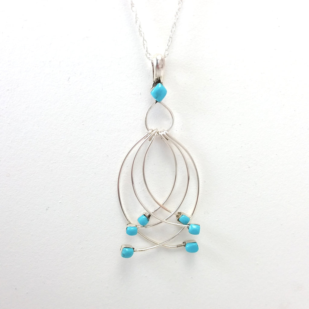 Navajo turquoise sterling silver dangle pendant.