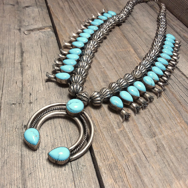 Leon Kurley turquoise sterling silver squah blossom.